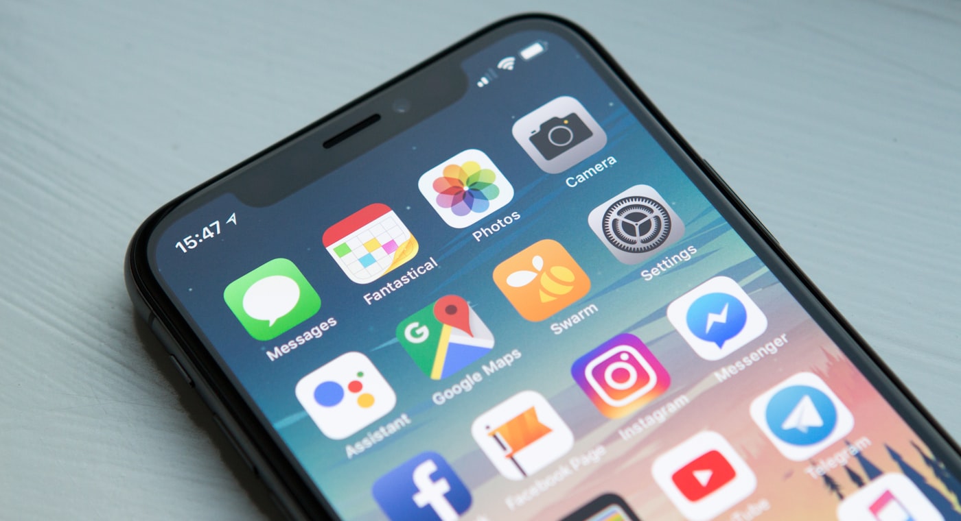 A phone showing social media apps